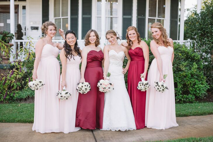 Stacy Maid and Matron of Honor stood out amongst the pale pink bridesmaid dresses in burgundy gowns. "We went with burgundy because its a great fall color but its also one of our University of South Carolina school colors!"