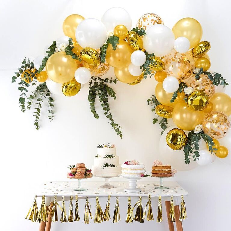 Gold balloon arch decoration kit for a bachelorette party. 