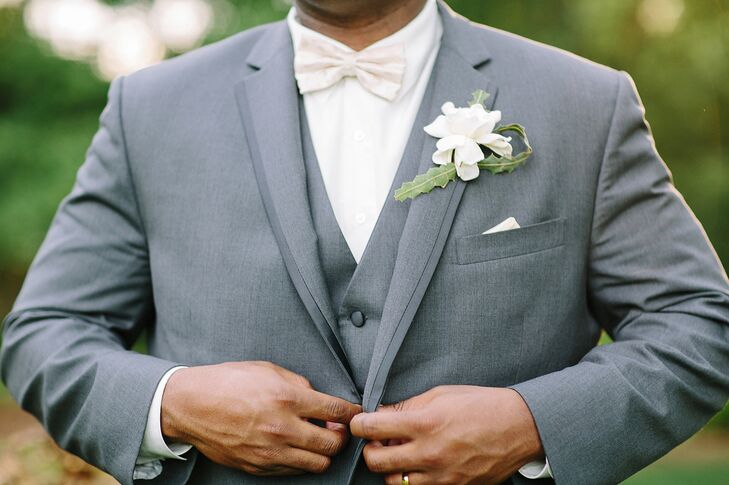 The men wore a simple white gardenia with banksia foliage boutonnieres to compliment the brides bouquet.
