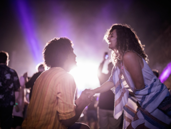 Man proposing to girlfriend at concert