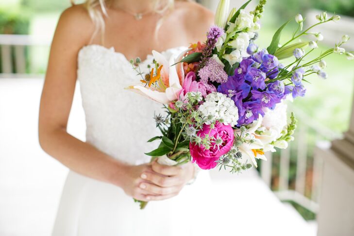 Lisa chose the flowers for her bridal bouquet by  purchasing stems from a local farm. "A few days before I had a gal at the farm create my bouquet," she says. "I really wanted it to look like I had just gone out to my garden and picked what was blooming."