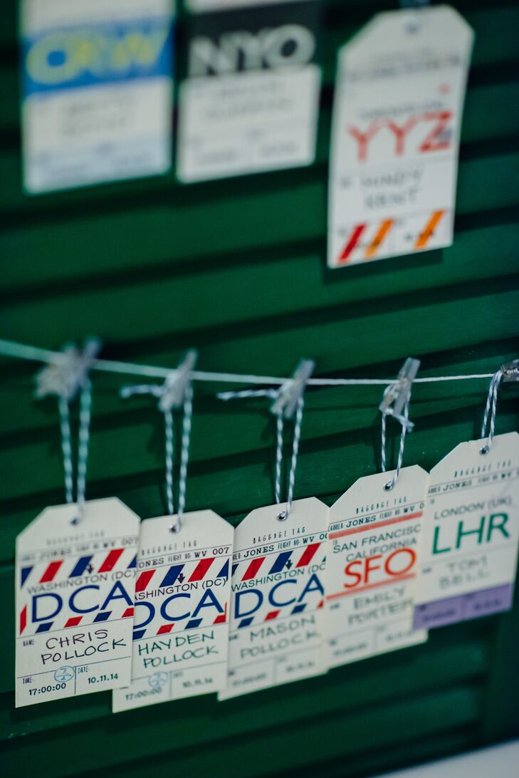 Anna created many aviation-themed details that reflected their love for traveling, including the vintage-style baggage tags that served as escort cards.