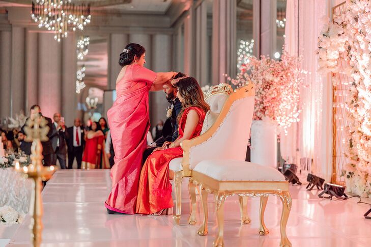 Mother of the Groom Welcome Blessing Over Couple, Saying Prayer With Hands on Head