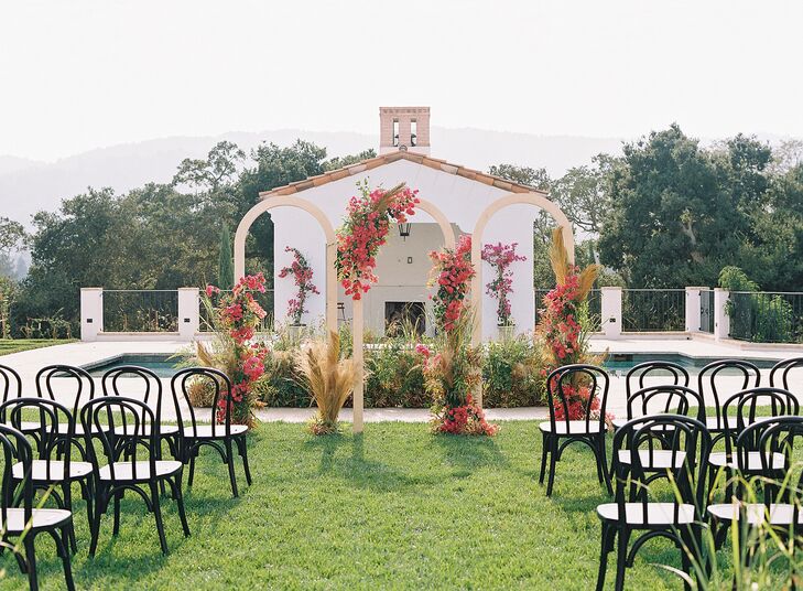 Wedding Ceremony With Triple Arch and Bentwood Chairs