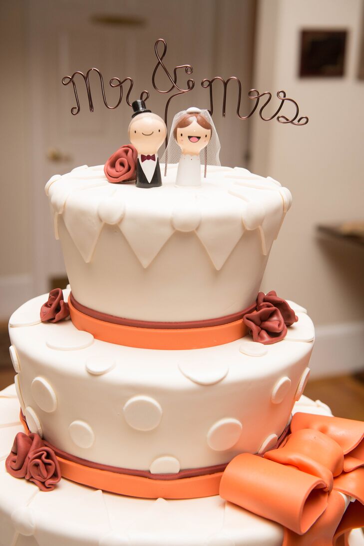 The ivory, orange and maroon cake was decorated with fondant and featured a cute cake topper from Etsy.
