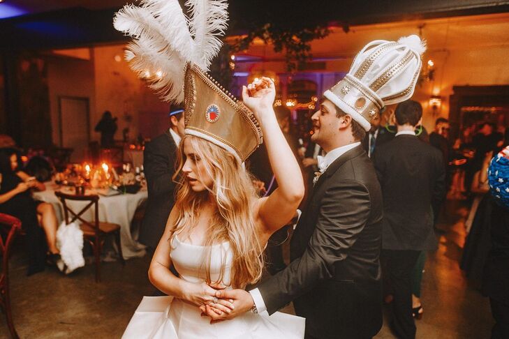 Bride and Groom Wearing Foam Crowns for Traditional La Hora Loca