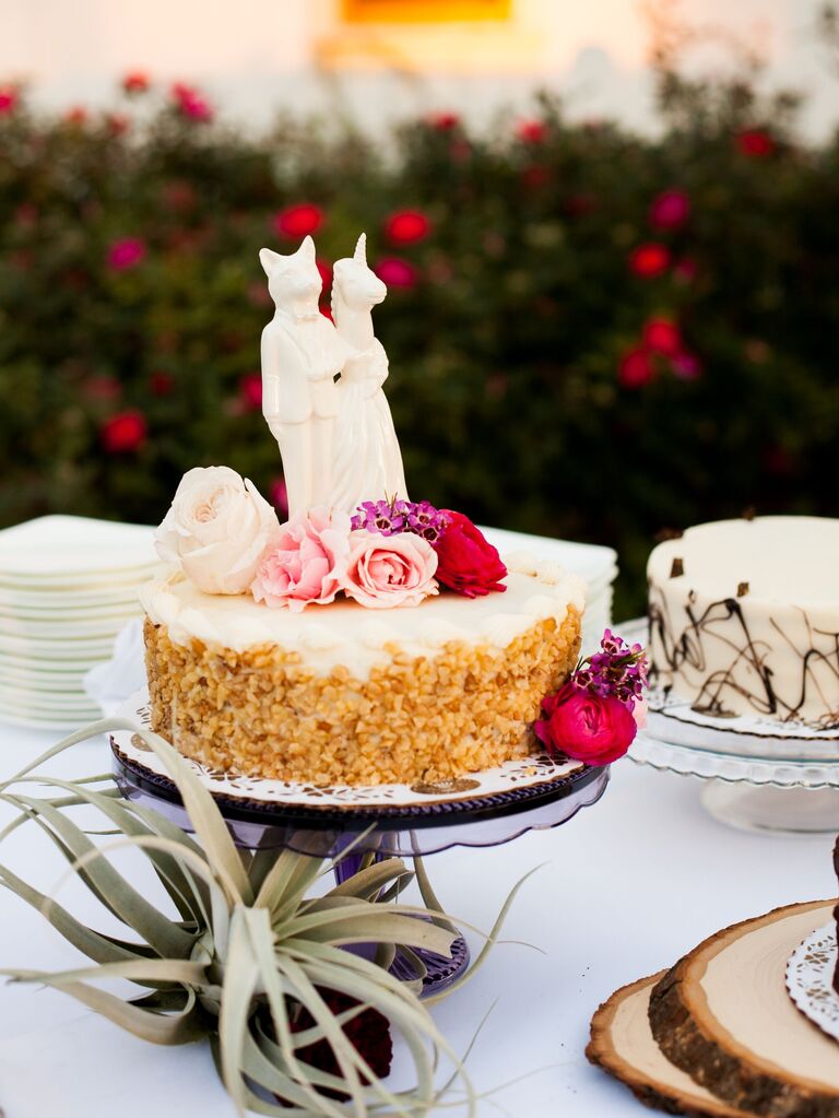 White fox and unicorn animal cake toppers. 