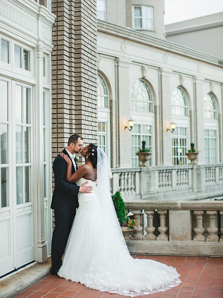 bride and groom kissing in Atlanta, GA