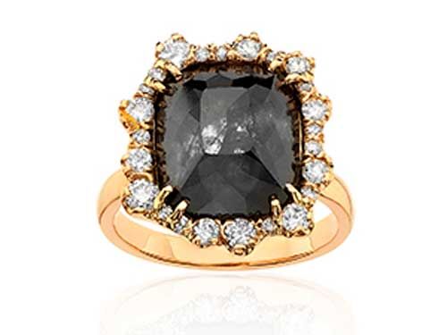 Black diamond engagement ring with sunburst diamond halo