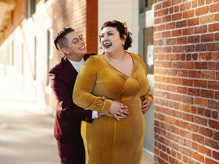 Couple embrace with their hair and makeup done by Candelaria Beauty in Denver, CO. 