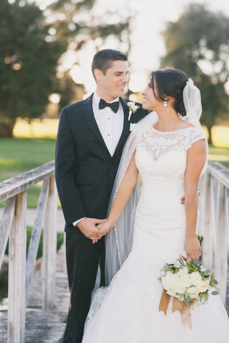 Tyler sported a classic look with his Black by Vera Wang suit, white collared shirt and black bow tie, which his groomsmen also wore.