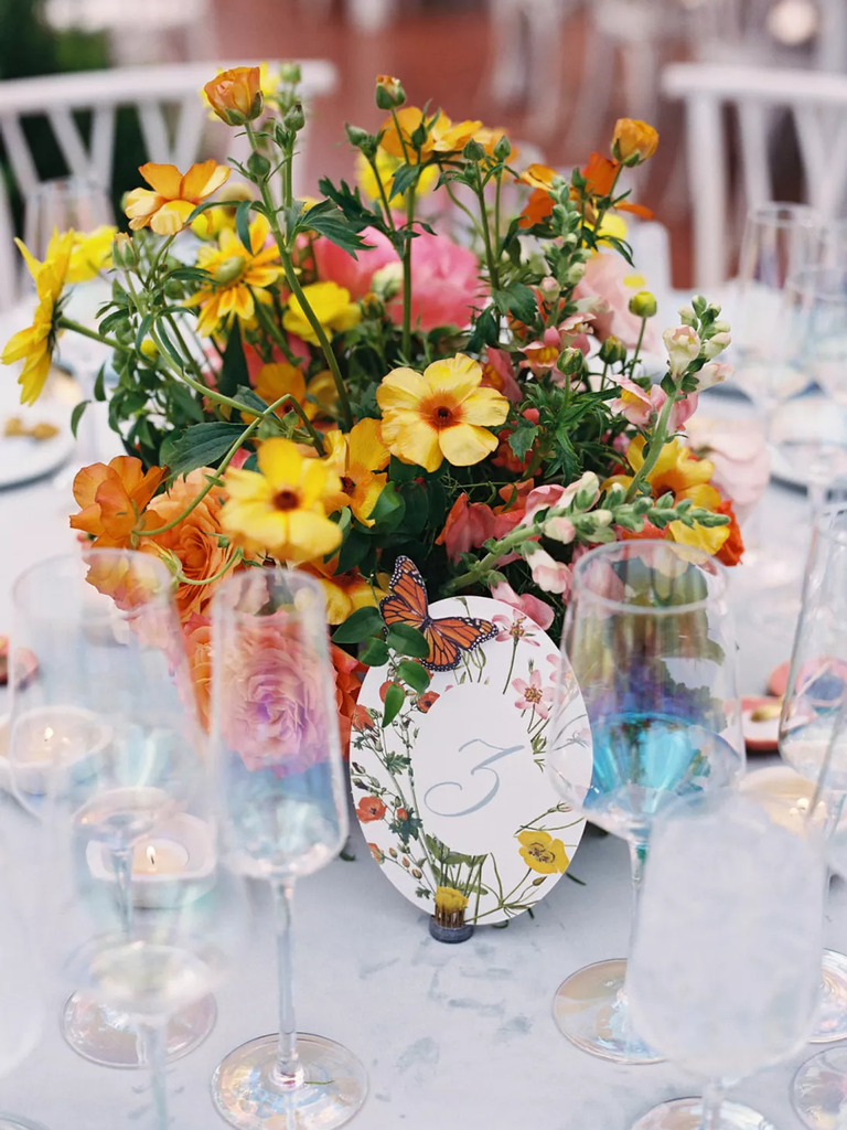 Butterfly table numbers with light blue calligraphy
