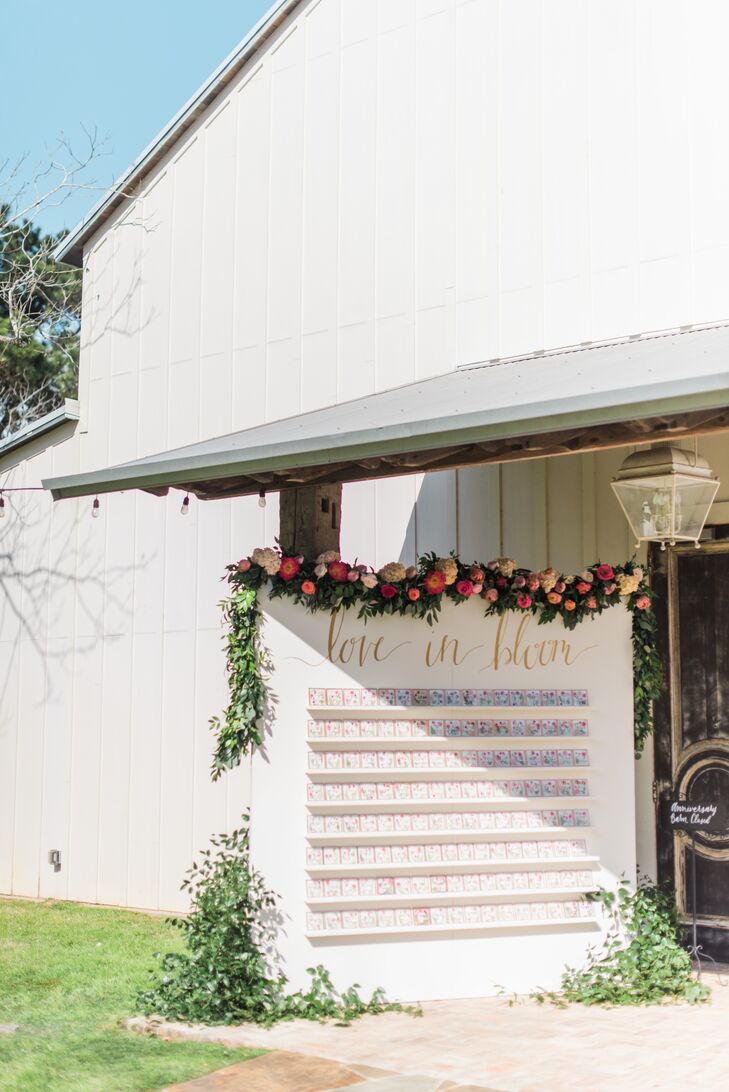 "To incorporate our floral theme, we made individually pressed flower coasters with our guests’ names and table numbers as escort cards, which doubled as favors," says Deborah.