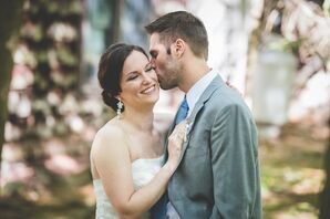 Loving Groom Kisses Wife During the First Look