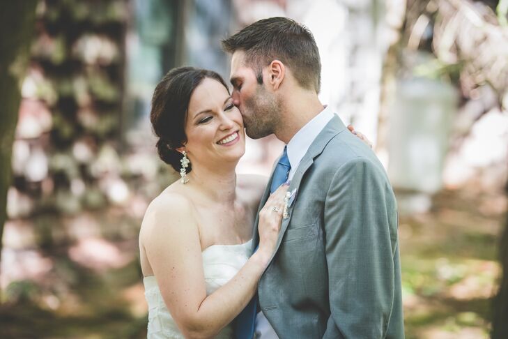 Loving Groom Kisses Wife During the First Look