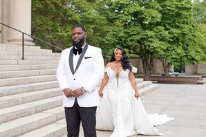 Bride in Fitted Gown Approaching Groom in White-and-Black Tuxedo for First Look, Museum Steps