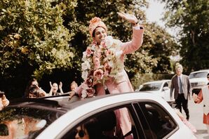 Groom Entering Wedding in Car During Baraat