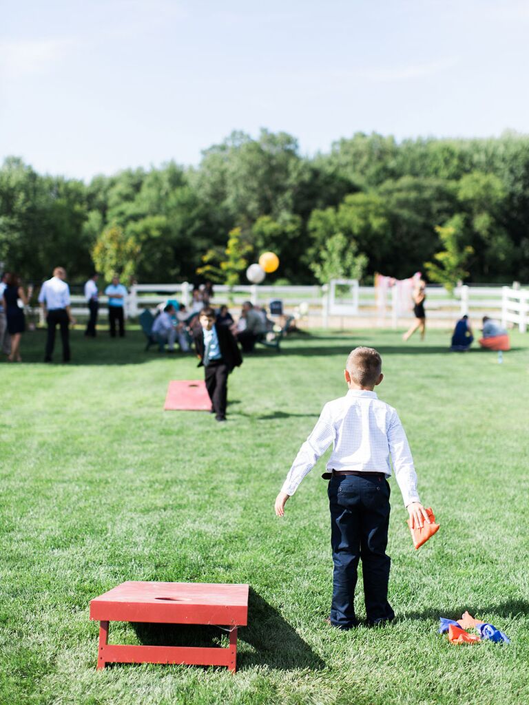 Lawn games cornhole for an outdoor wedding reception