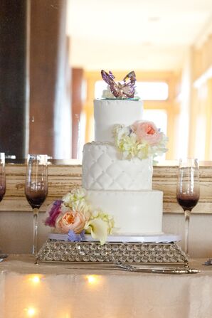 White Triple Tier Wedding Cake with Butterfly Topper