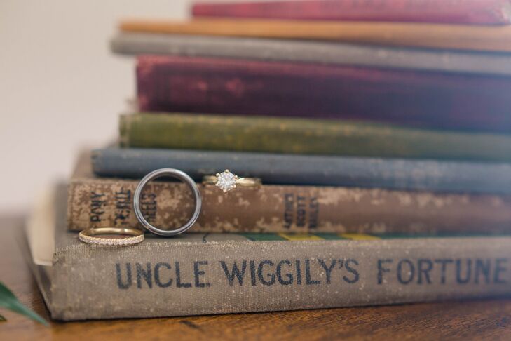 Gold Solitaire Diamond Ring on Vintage Books