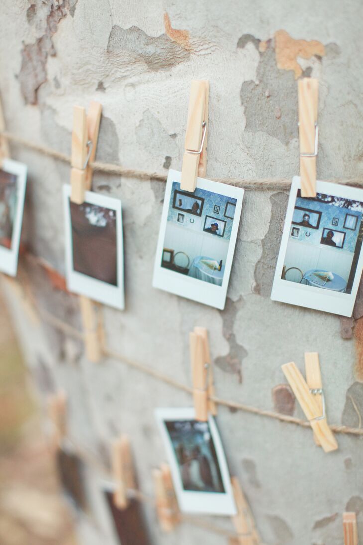 Escort cards were actually polaroids of various spots that meant something significant to the couple and hung up on strings of twine, secured with clothespins.