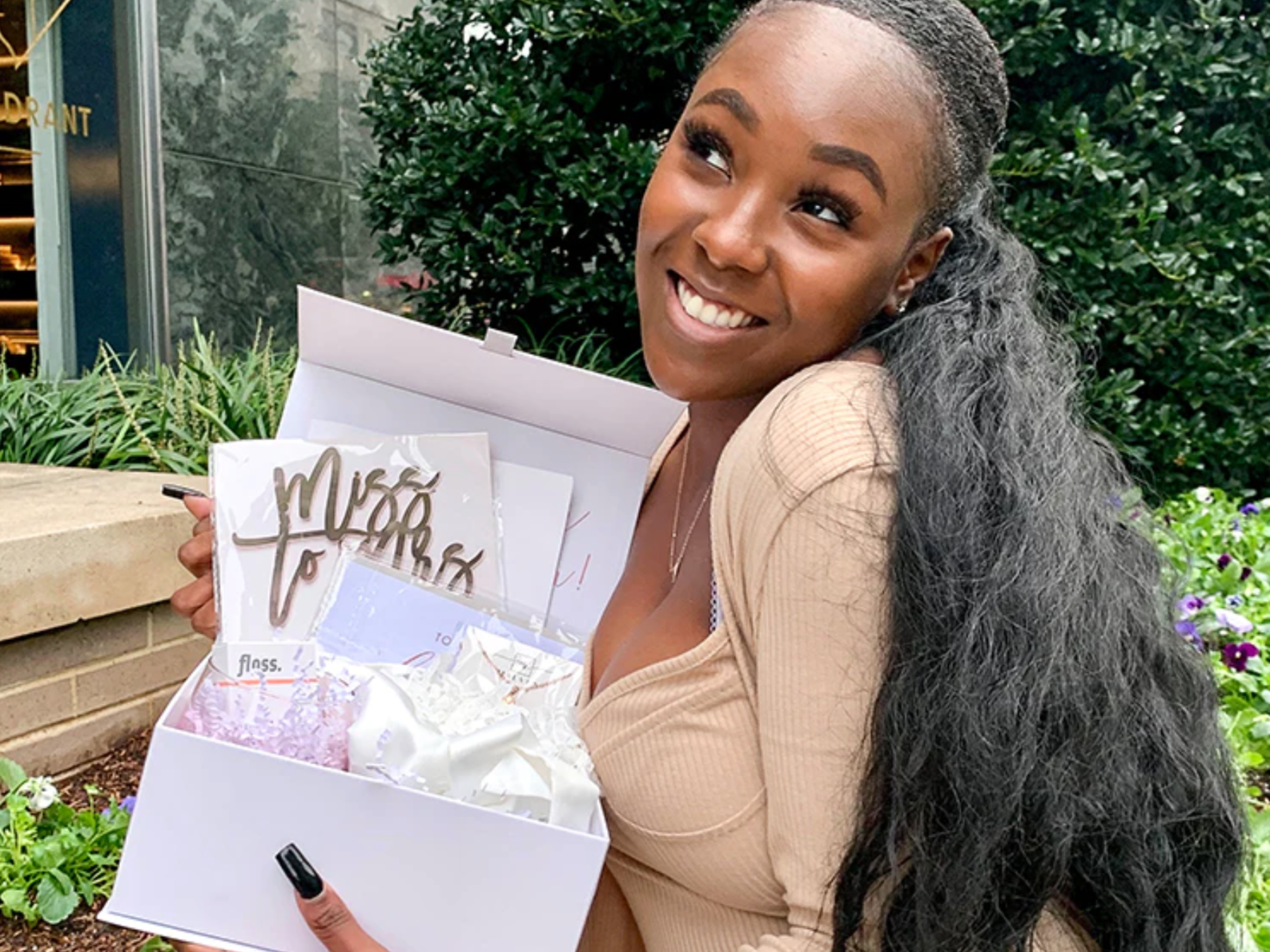 Woman holding Maeven bridal subscription box