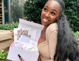 Woman holding Maeven bridal subscription box