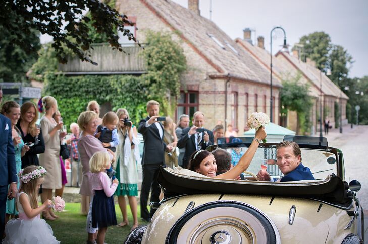 Bride and Groom Exit in Classic Vintage Cream Car