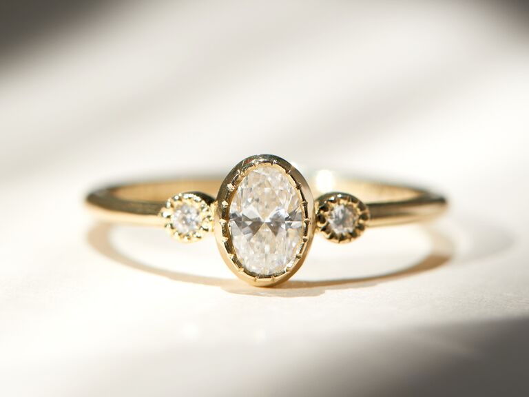 three-stone diamond vintage-looking engagement ring