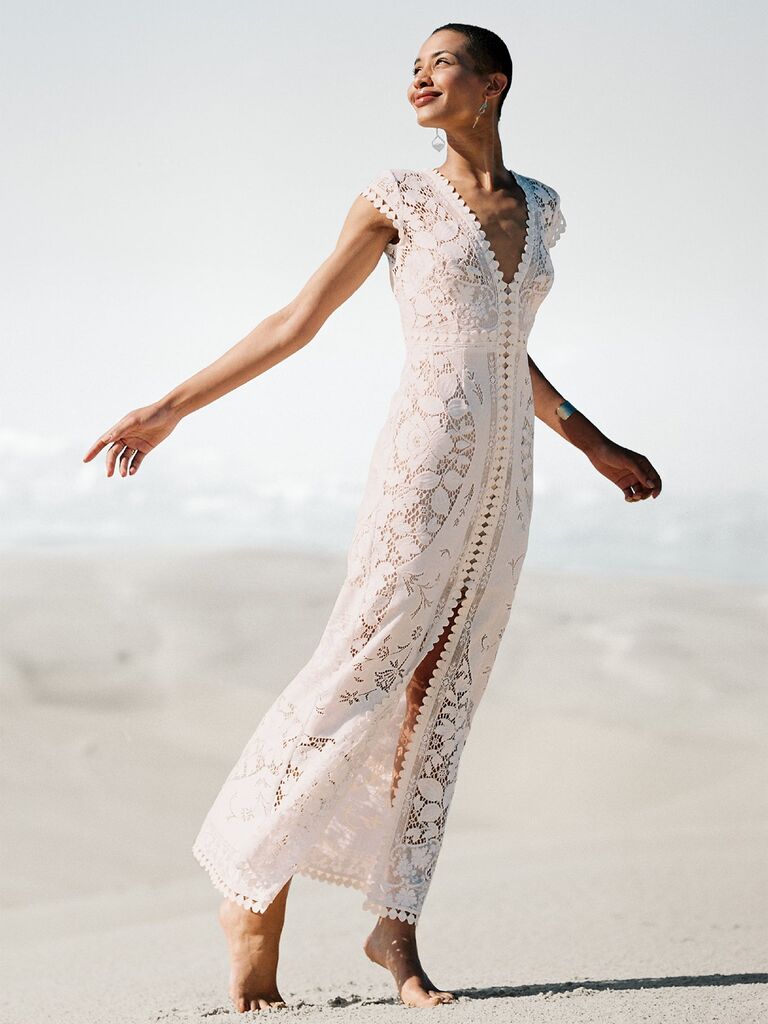 Model wears a bohemian lace Lost in Paris dress. 