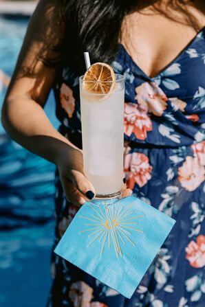 Signature Cocktail With Dried Orange Garnish