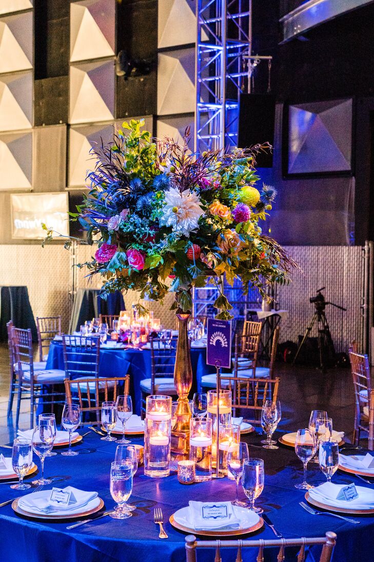 Tall Colorful Centerpieces and Blue Linens