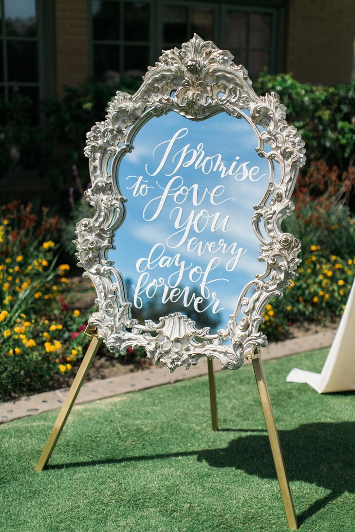 Several framed mirrors were placed around the ceremony entrance and the reception, each was decorated with calligraphed phrases such as "I promise to love you every day of forever."