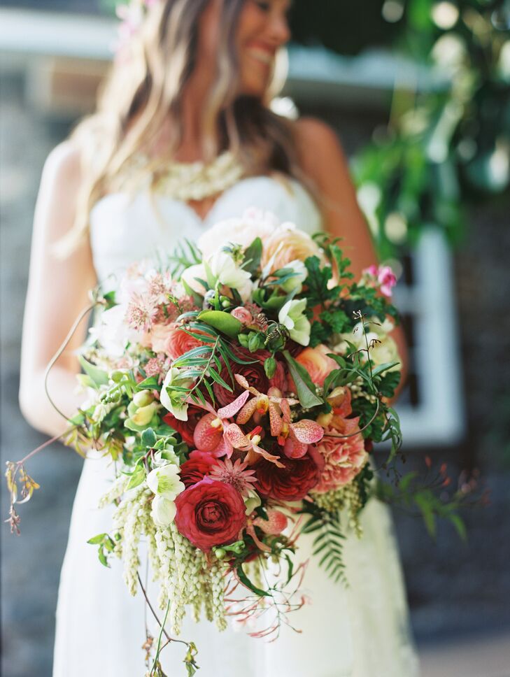 "I wanted my bouquet to look like I was walking through a field of wildflowers and just scooped some up," Laura says. "It was wild with a lot of greenery and flowers going every which way. It was perfect."