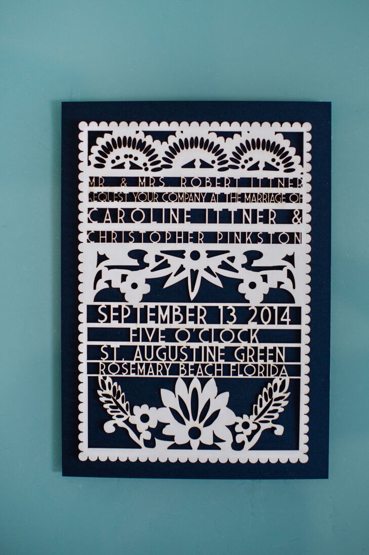By working with Studio EQ through Etsy, Caroline and Christopher designed an invitation that resembled the papel picados in their reception. “I searched high and low on Etsy to find the right person to do it at the right price,” Caroline says. Each one had this white floral cut-out design along the front.