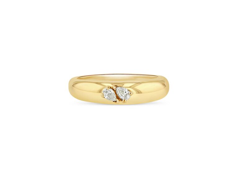 domed yellow gold with two small pear shaped diamonds 