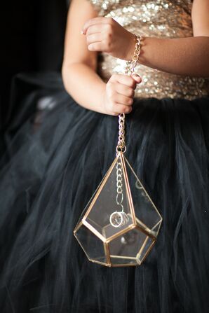 Ring Bearer in Gold Sequined Dress with Geometric Glass Purse