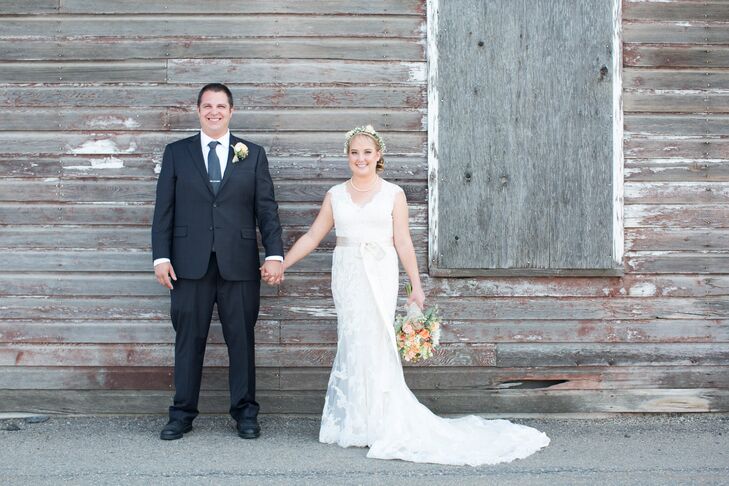 "We went for a vintage country look to fit the feel of the venue," Talia says. Talia wore a Maggie Sottero fitted, lace wedding dress with cap sleeves and a champagne sash while Casey wore a classic black suit.