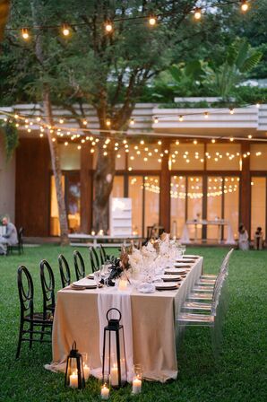 Black-and-Tan Tablescape Under String Lights