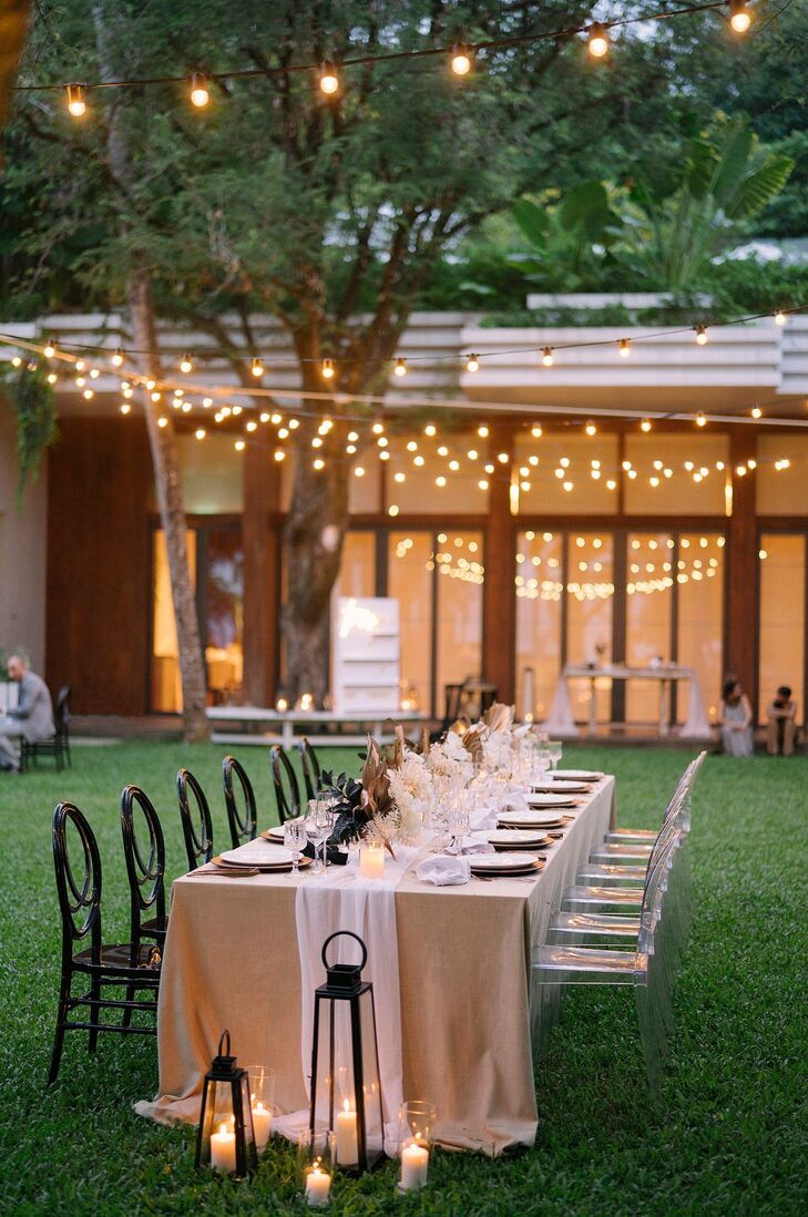 Black-and-Tan Tablescape Under String Lights