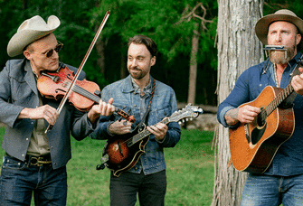 Three country musicians playing at a wedding ceremony. 