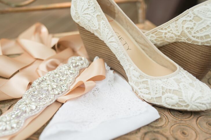 Jennifer paired her lace gown with lace wedge heels from Sole Society and a beaded sash from Etsy.