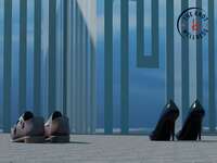 couple chatting and leaving shoes at the door