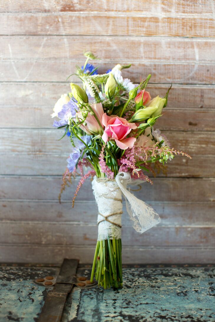 The bride carried a cluster of colorful wildflowers grown on a local North Carolina farm.