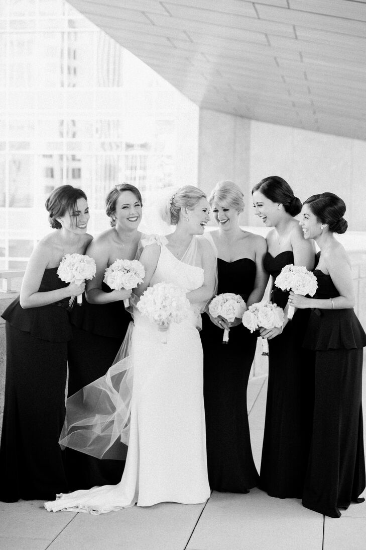 Lynn’s five bridesmaids all wore the same black floor-length Badgley Mishka gowns from Rent the Runway. Lynn didn’t want her friends to break the bank purchasing dresses and alterations, and loved how affordable and easy Rent the Runway was.