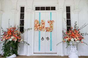 Bold Pink Flower-Filled Urn Wedding Altar