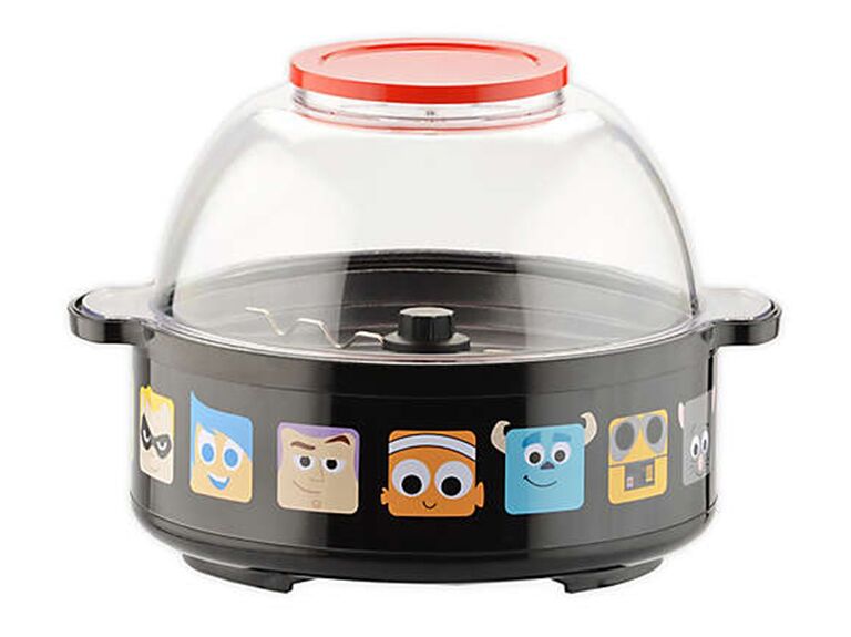 Popcorn maker with Pixar cartoon characters like Nemo and Sully along the bottom