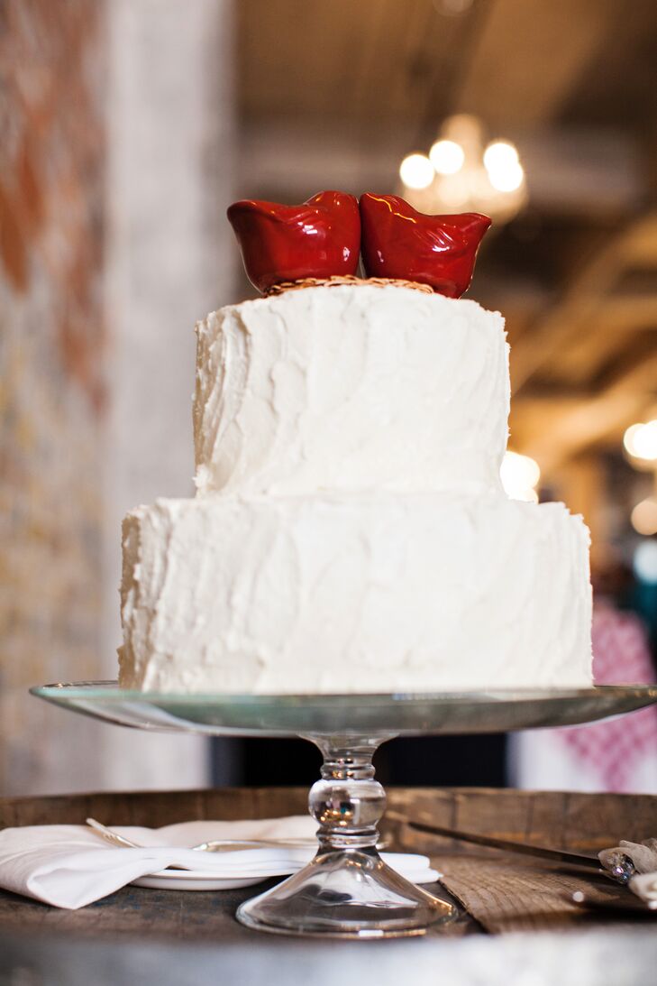 Molly and Boston's cake was very modest. It was a two-tier red velvet confection created by D'Amico Catering. In honor of their last name, the textured buttercream was topped with two red cardinals. They also served passion fruit doughnuts, cookies, brownies and coffee.
