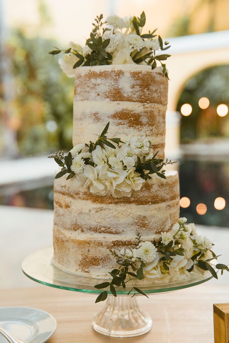 Naked Wedding Cake with White Flowers and Greenery