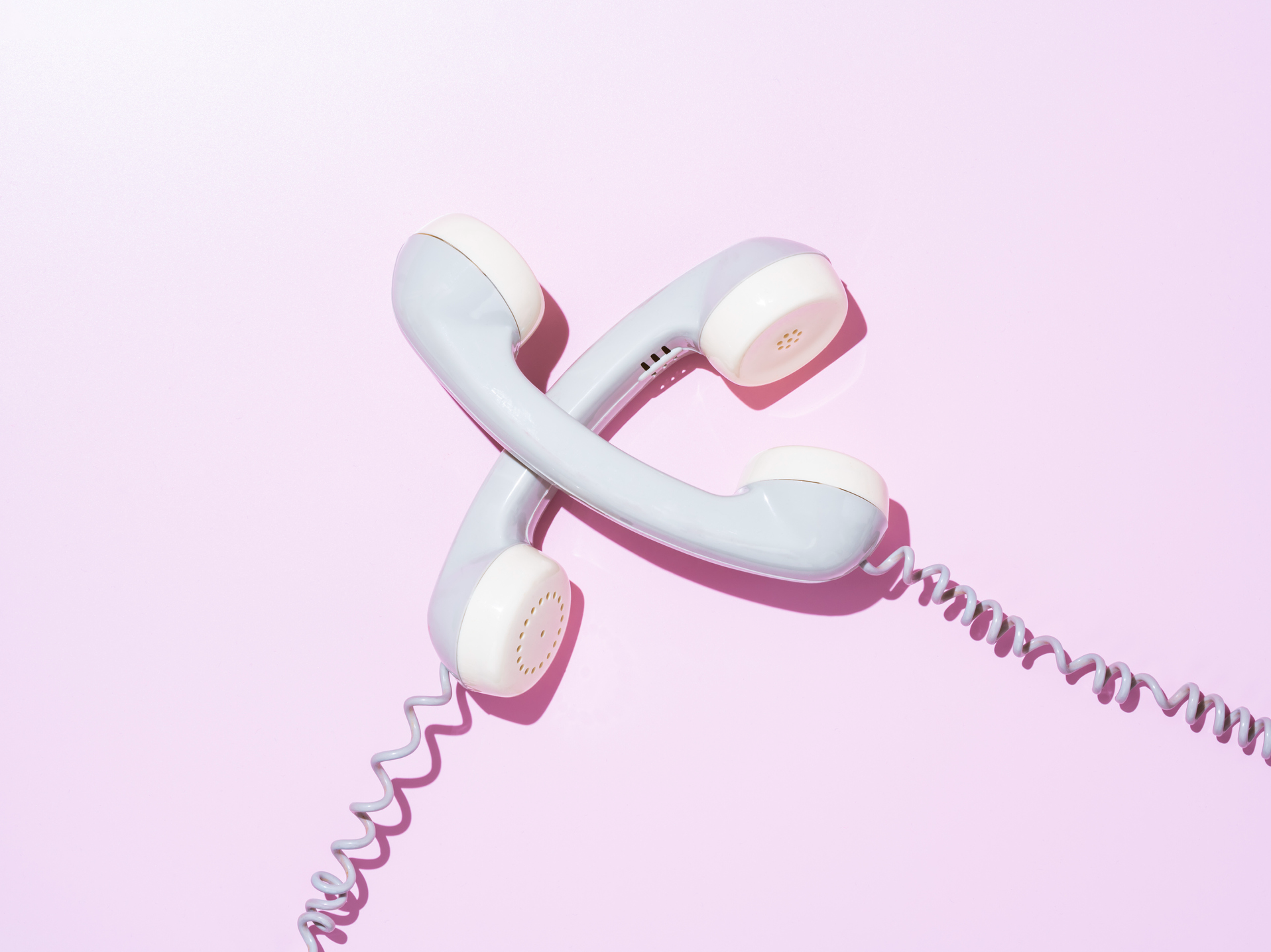 telephone on pink background